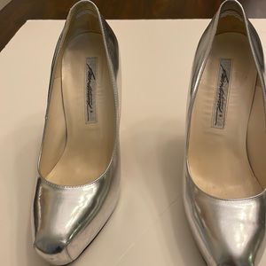 Silver Brian at work very high heels